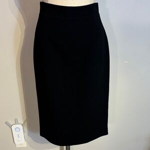 Judith and Charles black pencil skirt with exposed back zipper size 8